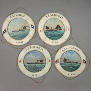 Group of maritime paintings in lifesaver frames