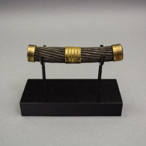 Section of the Atlantic Cable, mounted on black custom stand