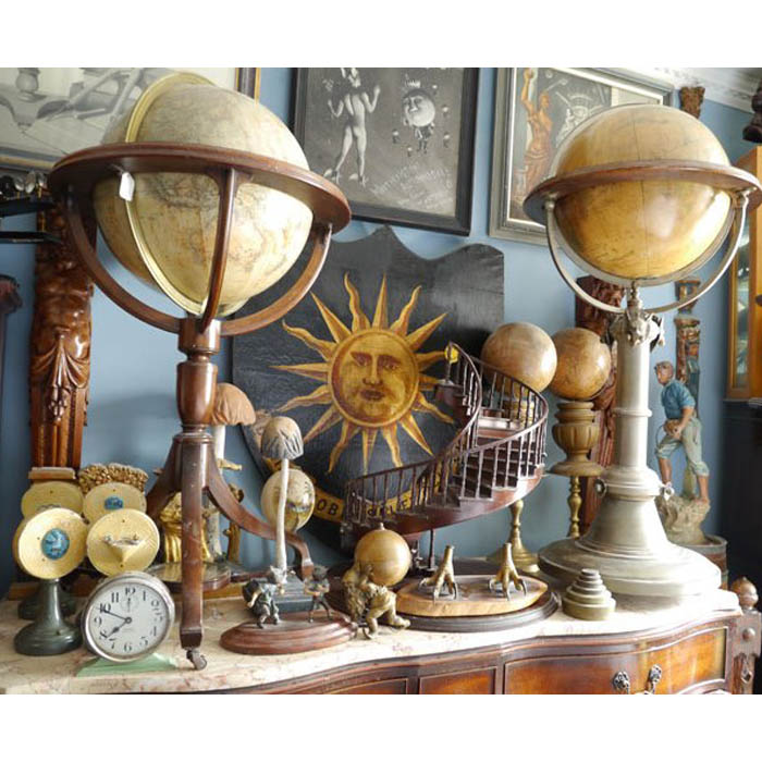 Painted plaque with sun motif, miniature staircase and miniature globes